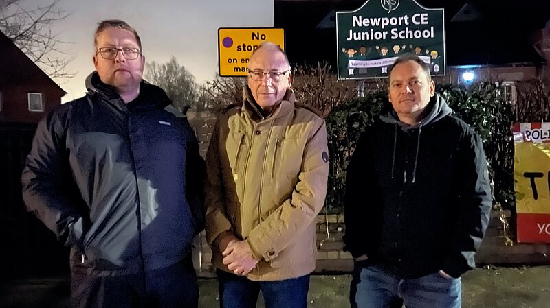 Cllr Thomas Janke discusses the disappointing scrapping of the scheme for a safer school run with Cllr Mark Wiggin and Cllr Paul Crewe outside Newport Junior School